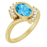 Oval Swiss Blue Topaz & Diamond Accented Ring in Yellow Gold
