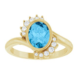 Oval Swiss Blue Topaz & Diamond Accented Ring in Yellow Gold