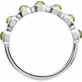 Round Peridot Cabochon Ring in Gold and Platinum