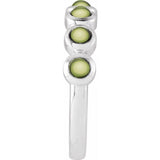 Round Peridot Cabochon Ring in Gold and Platinum