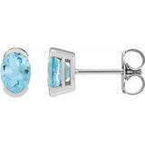 Sky Blue Topaz Oval Solitaire Stud Earrings in Gold and Platinum