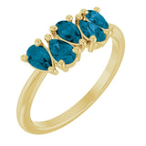 Pear London Blue Topaz Multi Stone Ring in Yellow Gold