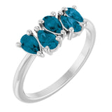 Pear London Blue Topaz Multi Stone Ring in White Gold