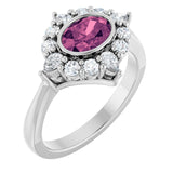 Oval Pink Tourmaline & Diamond Halo Ring in Gold and Platinum