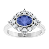 Oval Tanzanite Halo Ring with Diamond Accents in Platinum