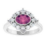 Oval Pink Tourmaline & Diamond Halo Ring in Gold and Platinum