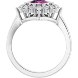 Oval Pink Tourmaline & Diamond Halo Ring in Gold and Platinum