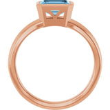 Emerald Sky Blue Topaz Solitaire Ring in Gold