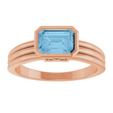 Emerald Sky Blue Topaz Solitaire Ring in Gold