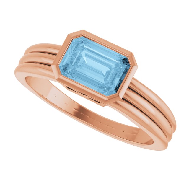 Emerald Sky Blue Topaz Solitaire Ring in Gold