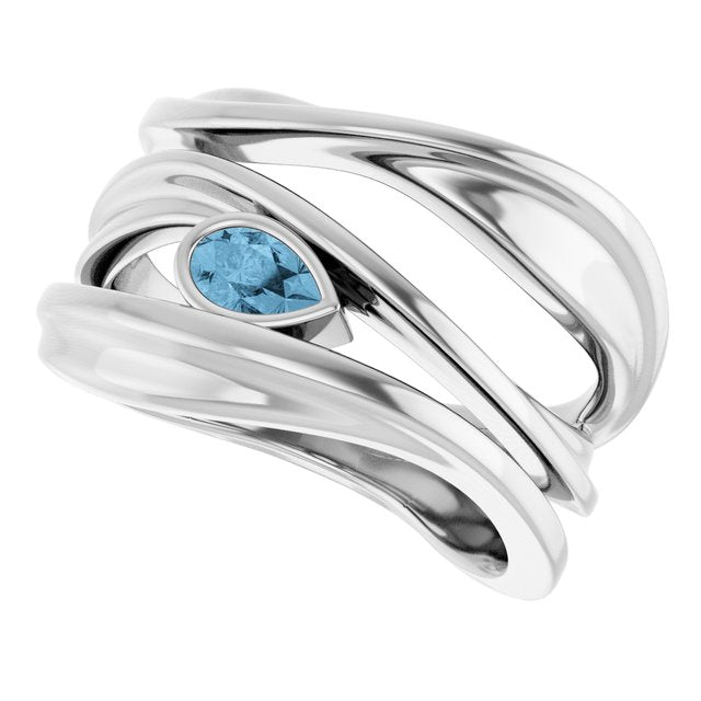 Pear Sky Blue Topaz Negative Space Ring in Gold