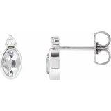 White Sapphire & Diamond Oval Bezel-Set Stud Earrings in Gold and Platinum