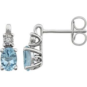 Sky Blue Topaz & Diamond Oval Stud Earrings in Gold and Platinum