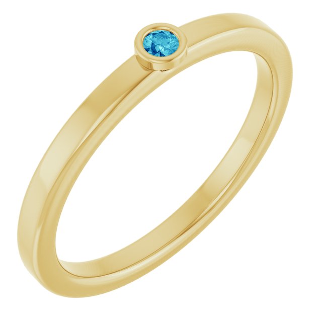 Round Blue Zircon Solitaire Ring in Gold