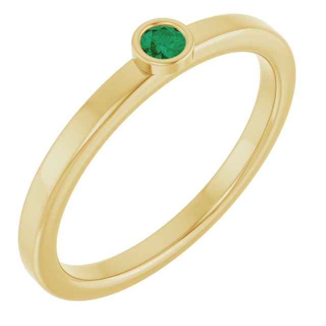 Round Emerald Solitaire Ring in Gold