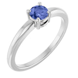 Round Tanzanite Solitaire Ring in Gold and Platinum