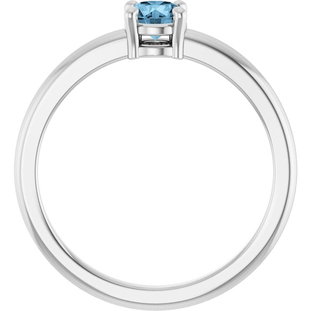 Round Sky Blue Topaz Solitaire Ring in Platinum