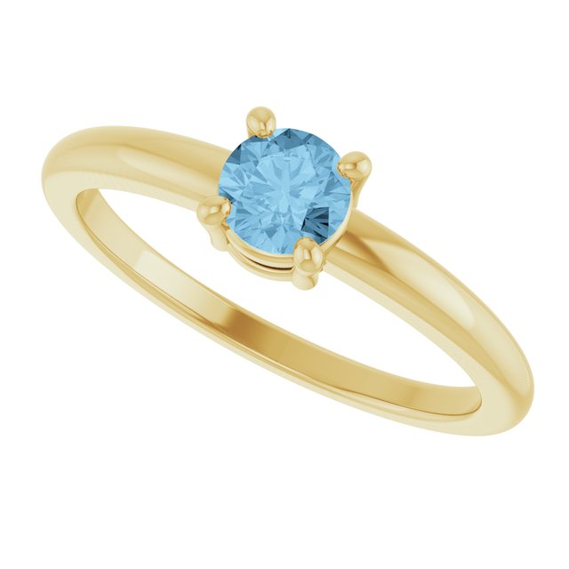 Round Sky Blue Topaz Solitaire Ring in Yellow Gold