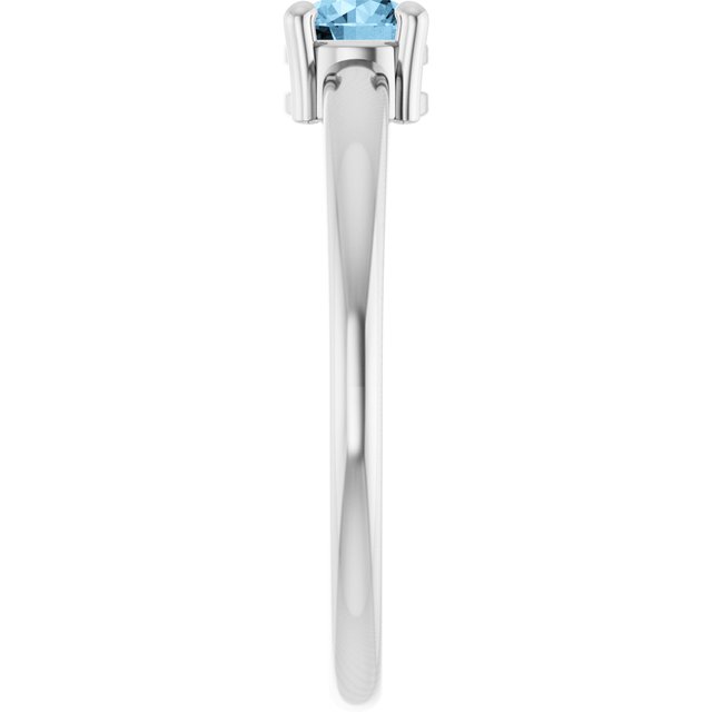 Round Sky Blue Topaz Solitaire Ring in Platinum