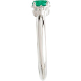 Round Emerald Three Stone Ring with Diamond Accents in White Gold