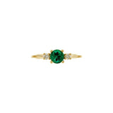 Round Emerald Three Stone Ring with Diamond Accents in Yellow Gold