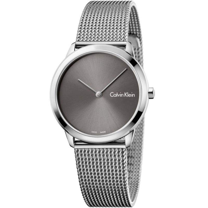 Silver Calvin Klein watch with mesh band on a white background