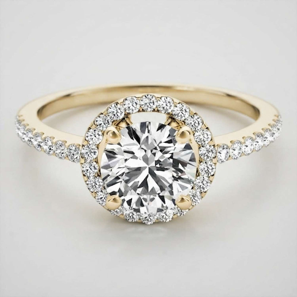 Elegant 18K white gold round brilliant-cut diamond engagement ring showcasing a secure prong setting.