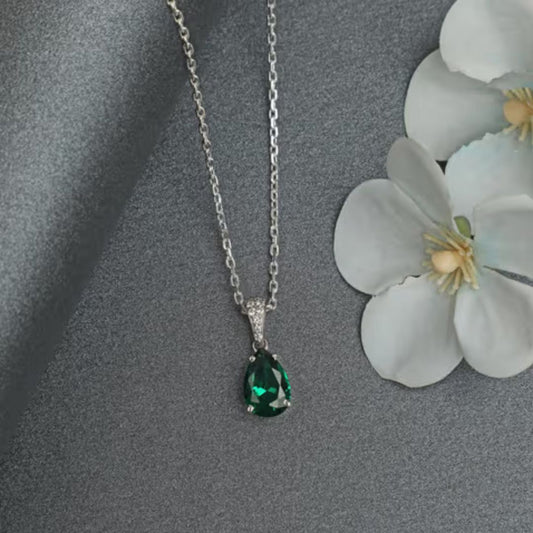 Lab Emerald And Diamond Solitaire Pear Cut Necklace In Silver