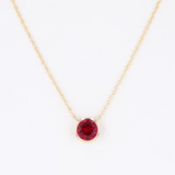 Bezel-Set Round Ruby Solitaire Pendant Necklace.