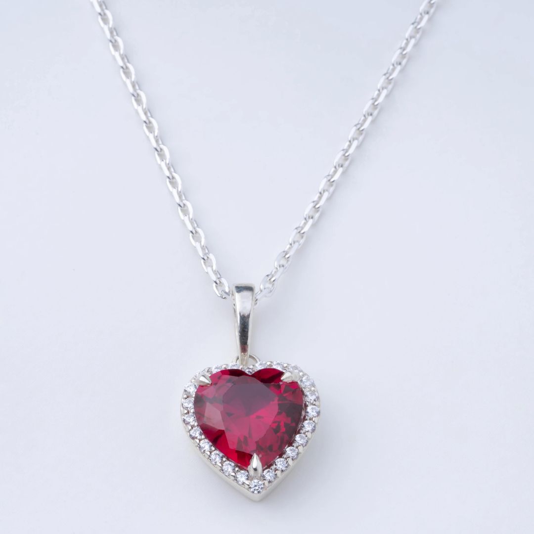 0.90Ct Heart Ruby and Lab Grown Diamond Halo Pendant Necklace in Gold