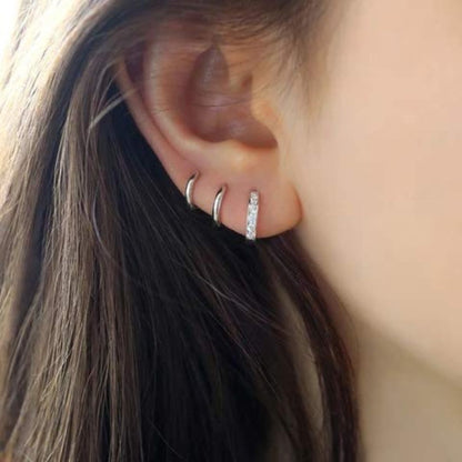 0.09 Round Diamond Huggie Earring In Gold