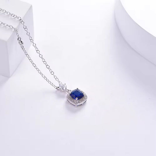 0.16ct Lab Sapphire And Diamond Halo Necklace In Silver