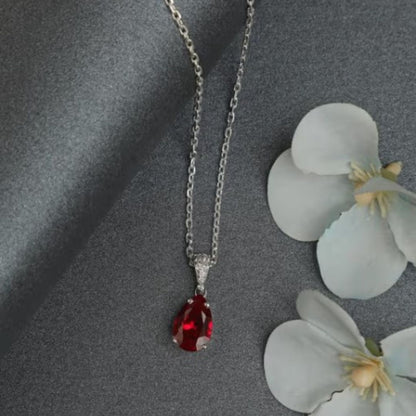 Lab Ruby Diamond Solitaire Pear Cut Necklace In Silver