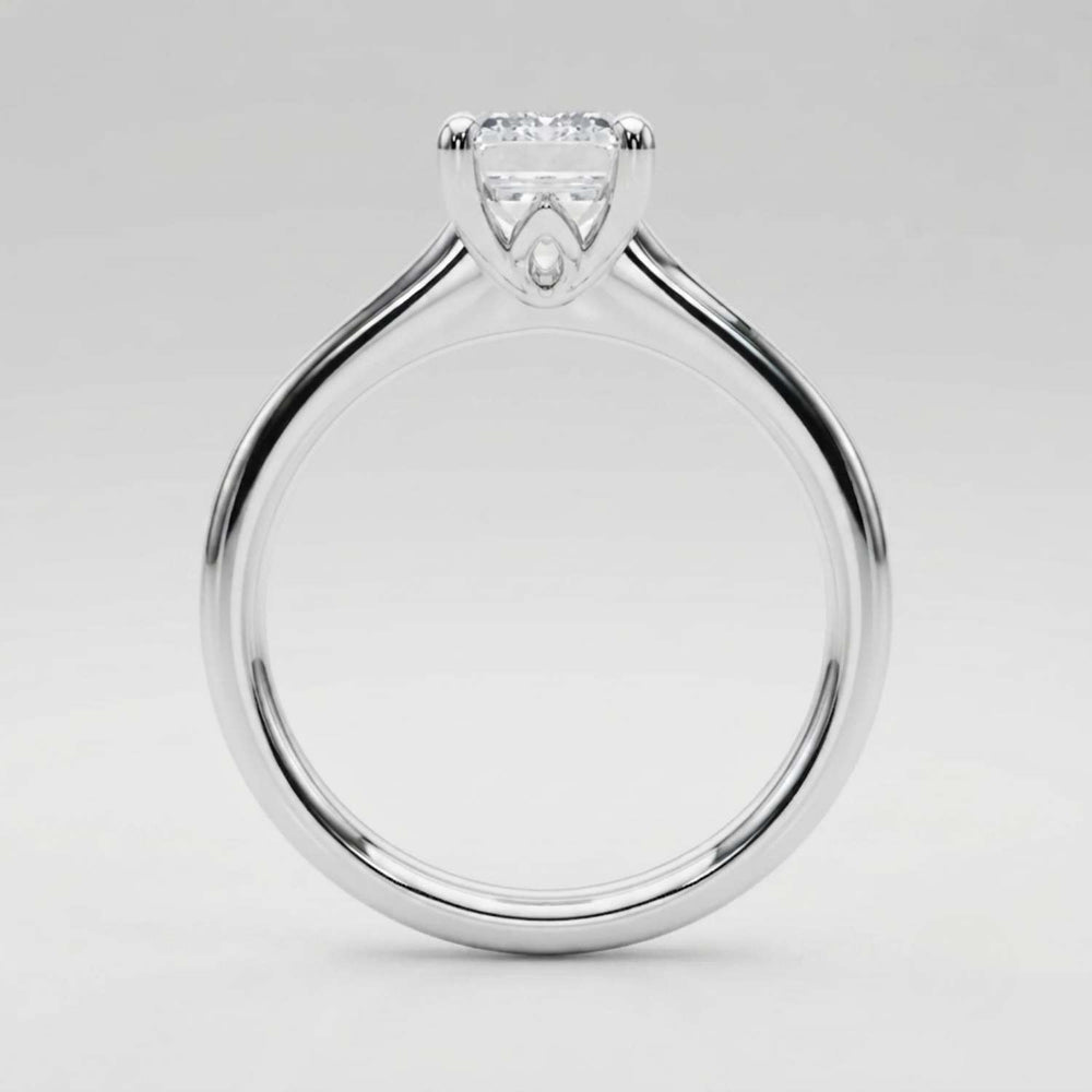 Statement 2.00Ct emerald-cut lab diamond ring featuring a secure four-prong basket setting.