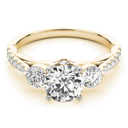 Gold ring with three diamonds on a white background