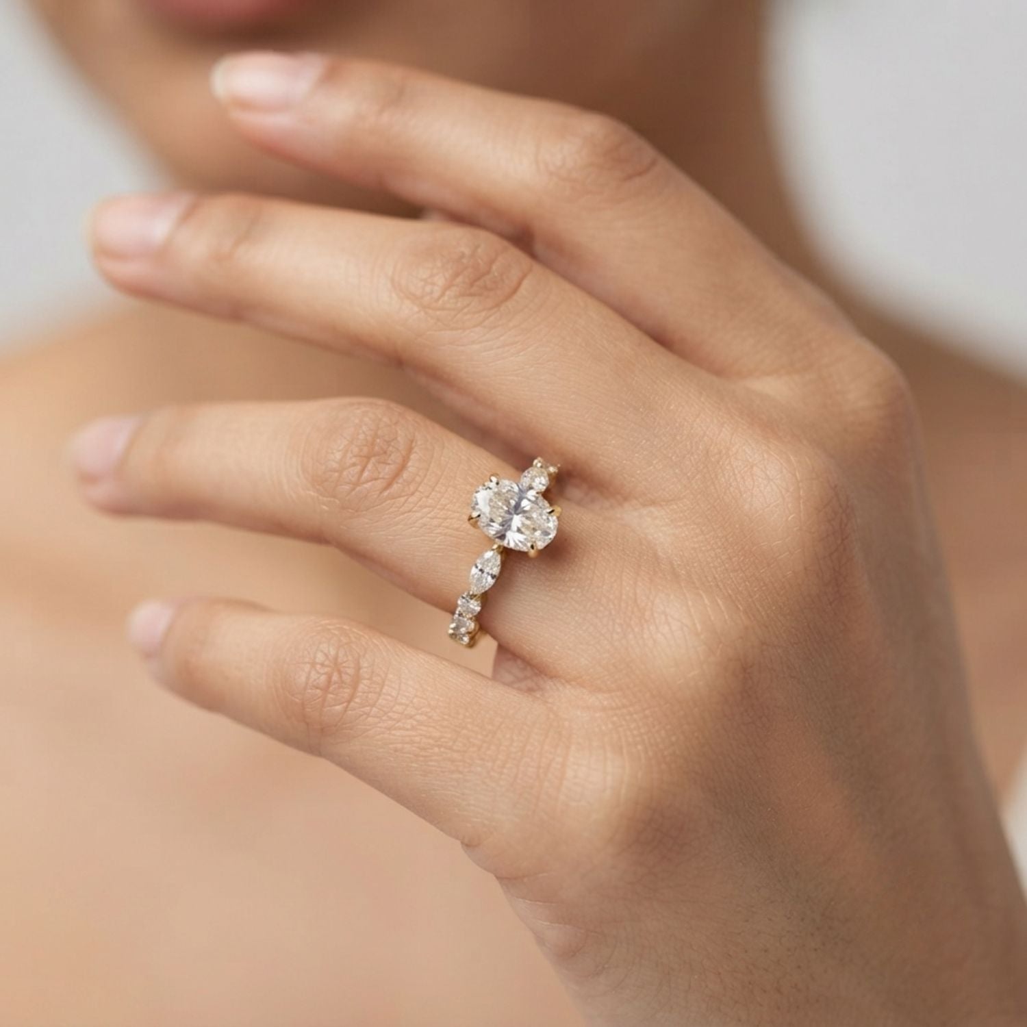 Oval Diamond Solitaire Engagement Ring with Marquise & Round Accent Band