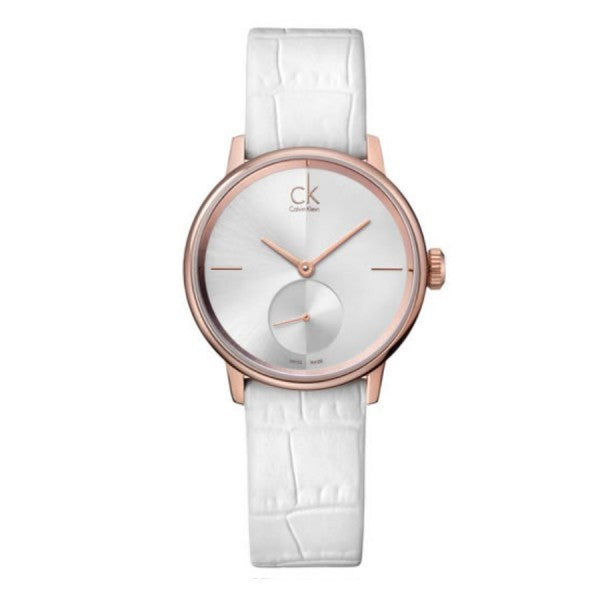 Calvin Klein Accent women's watch with silver dial and white leather strap.