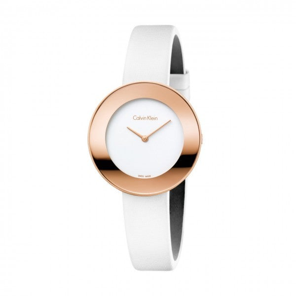 Calvin Klein watch with white strap and rose gold case on a white background