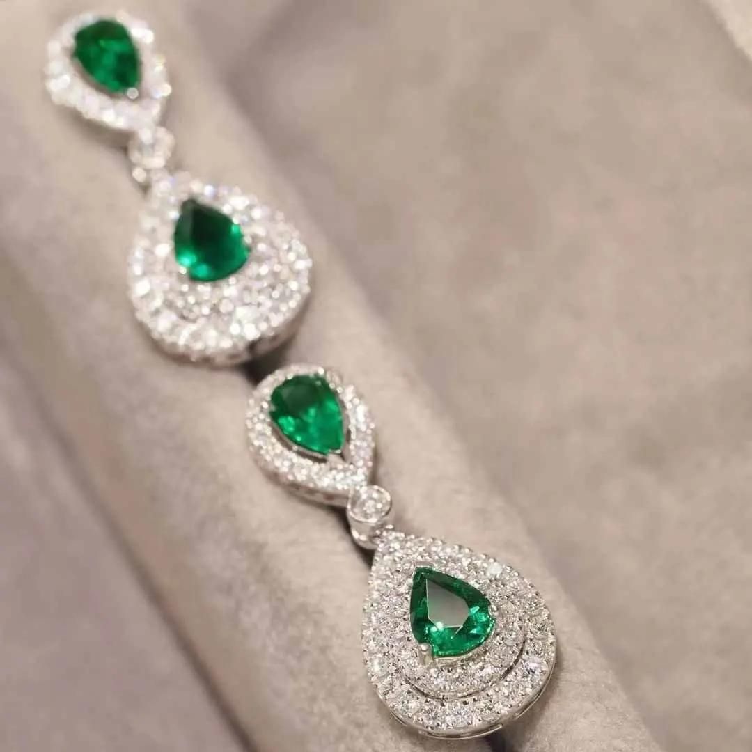 0.18ct Emerald Diamond Earrings In White Gold