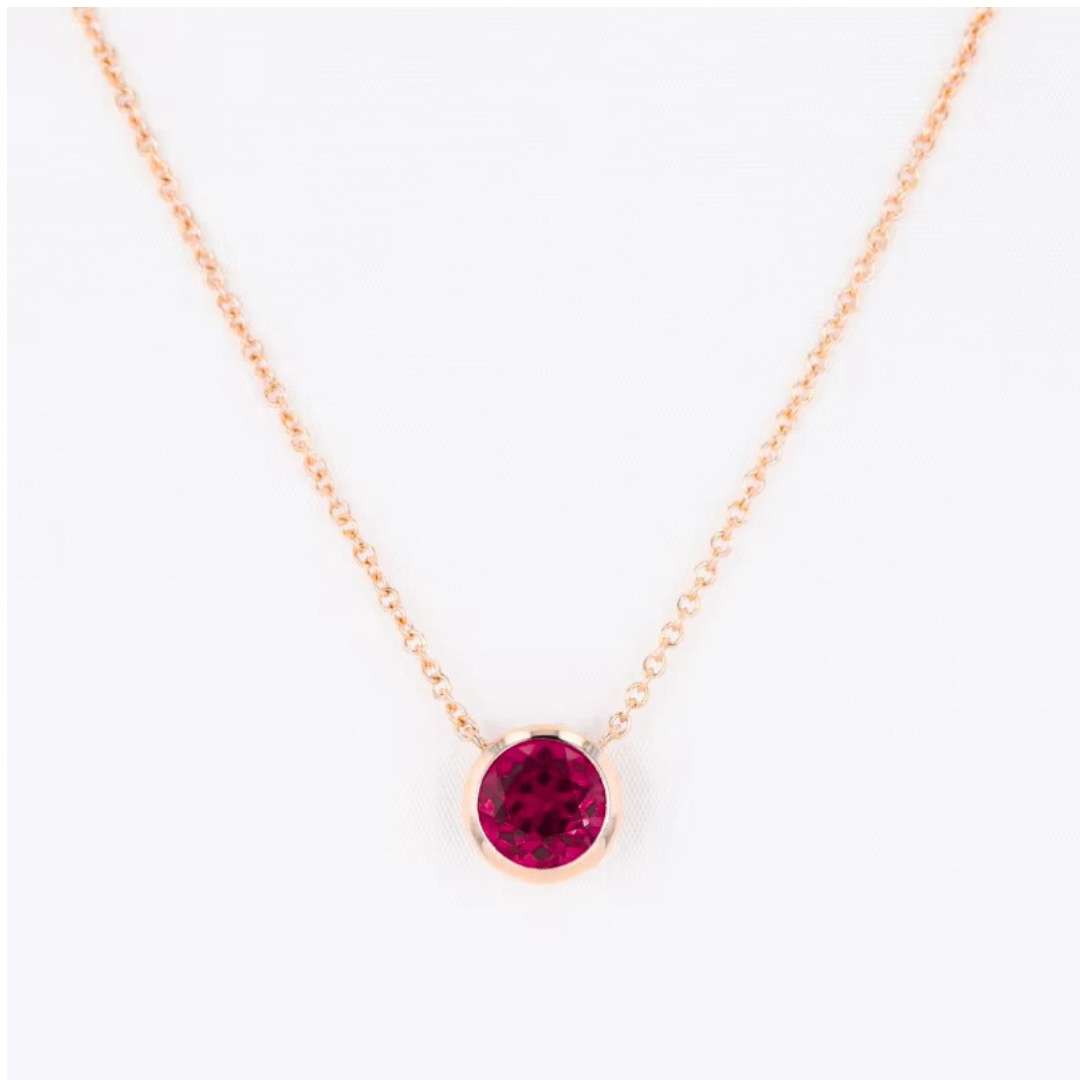 Bezel-Set Round Ruby Solitaire Pendant Necklace.