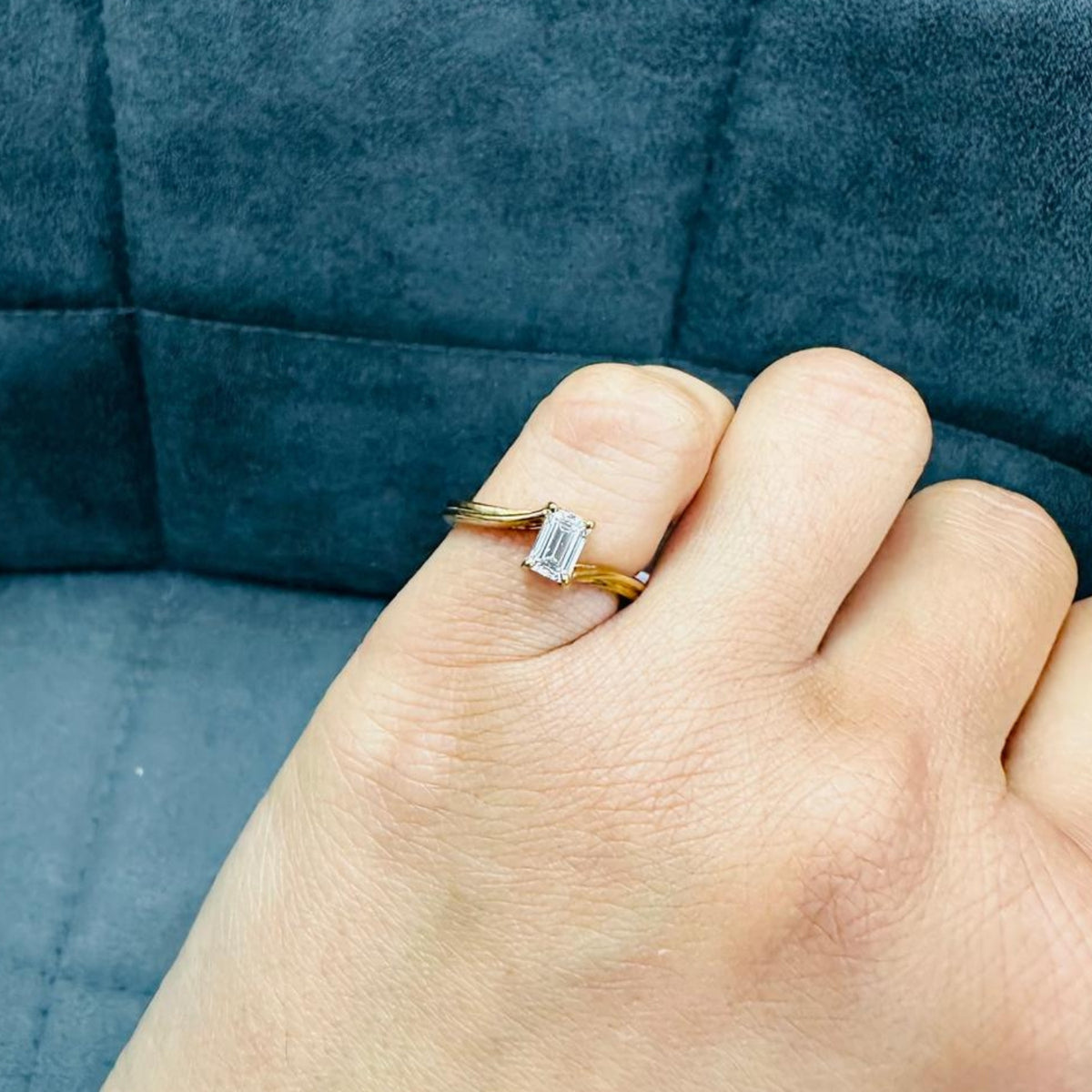 emerald cut bypass solitaire diamond ring 