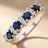 0.85ct Round Blue Sapphire and 0.03ct Diamond Dress Ring in 9K White Gold