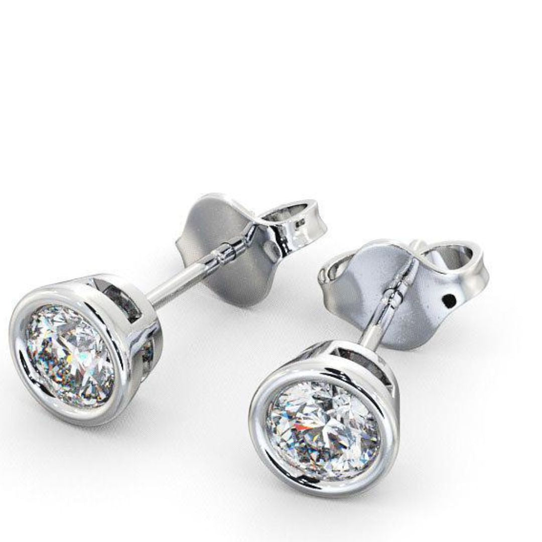 Diamond Stud Earrings In White Gold