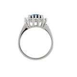 Oval Blue Sapphire Cluster Ring with Diamond Accents in Gold