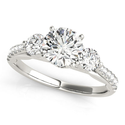 Diamond ring with three clear gemstones on a white background