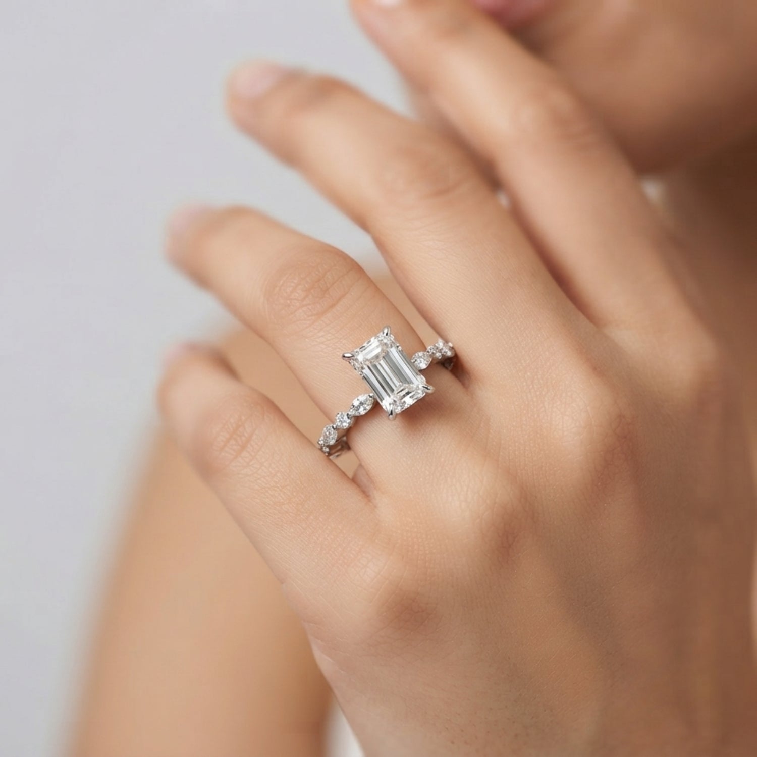 White Gold Radiant Cut Diamond Engagement Ring with Teardrop Side Stones