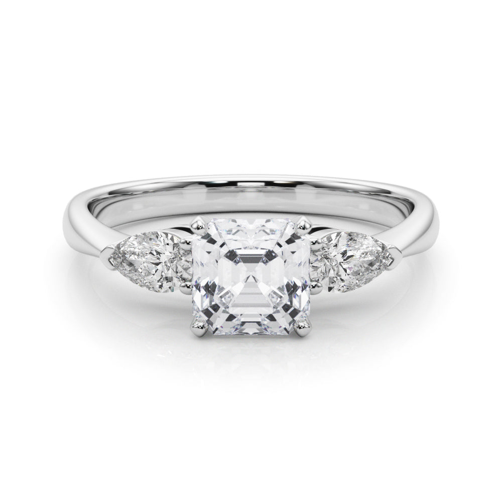 Timeless Three-Stone Pear Diamond Engagement Ring — 9K/18K Gold & Platinum
