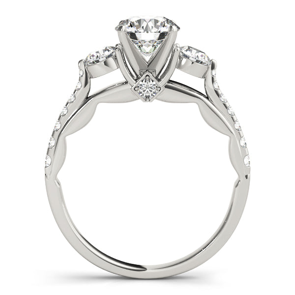 Diamond ring with a central gemstone and smaller stones on a white background