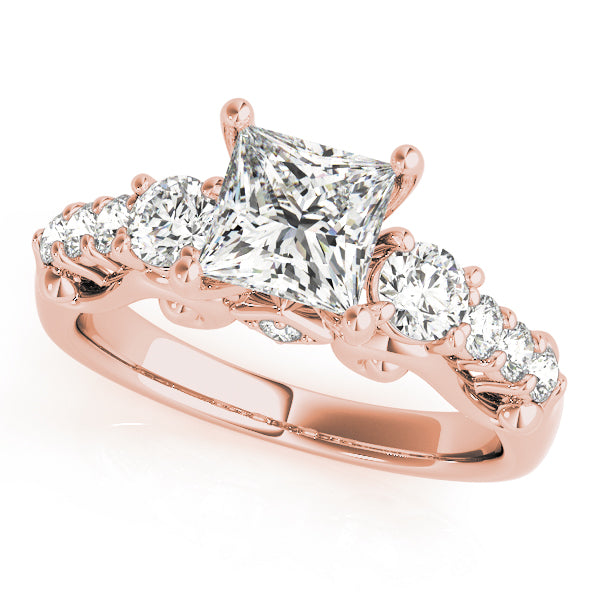 Rose gold ring with a central diamond and smaller diamonds on a white background