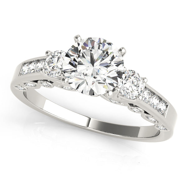 Diamond ring with three clear gemstones on a white background